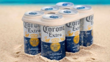 Pictured: Cans housed in a plastic-free alternative to typical six-pack rings. Image: Corona